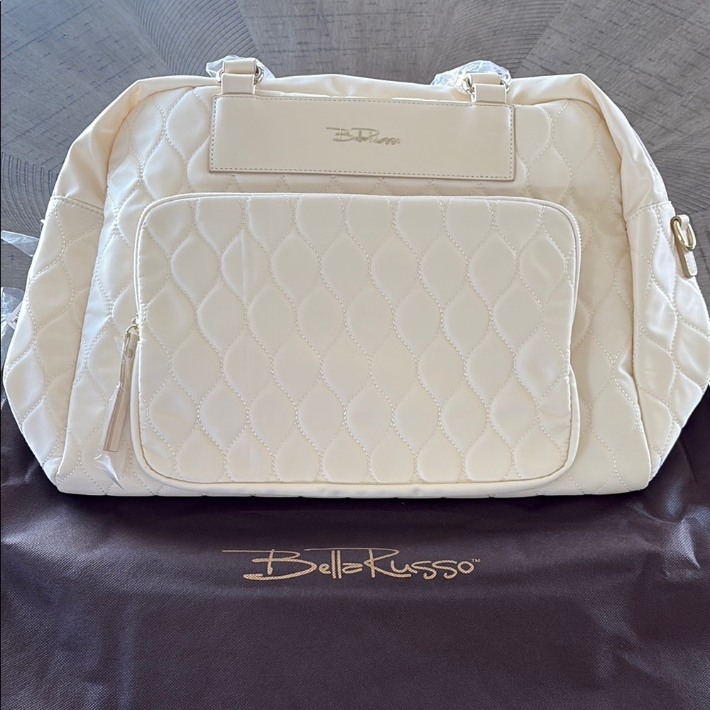 Elegant Cream Quilted Travel Bag with Structured Design
